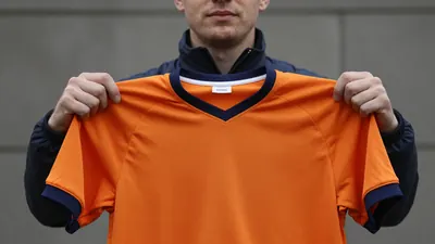 Beckham and Neville Reveal Bold New Orange Kit for Salford City